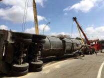 Recovering a rolled over tractor and trailer in Rochester NY