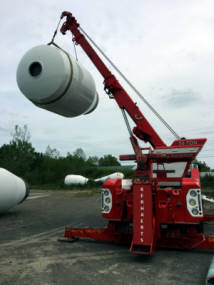 Kerhaert's of Rochester NY lifting a cement drum with 50 ton sliding rotator.